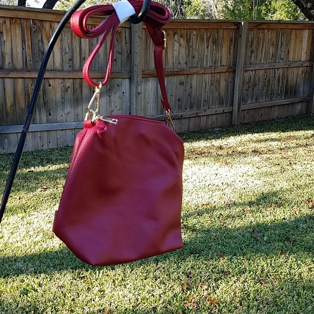 Small red vinyl clutch w/shoulder strap